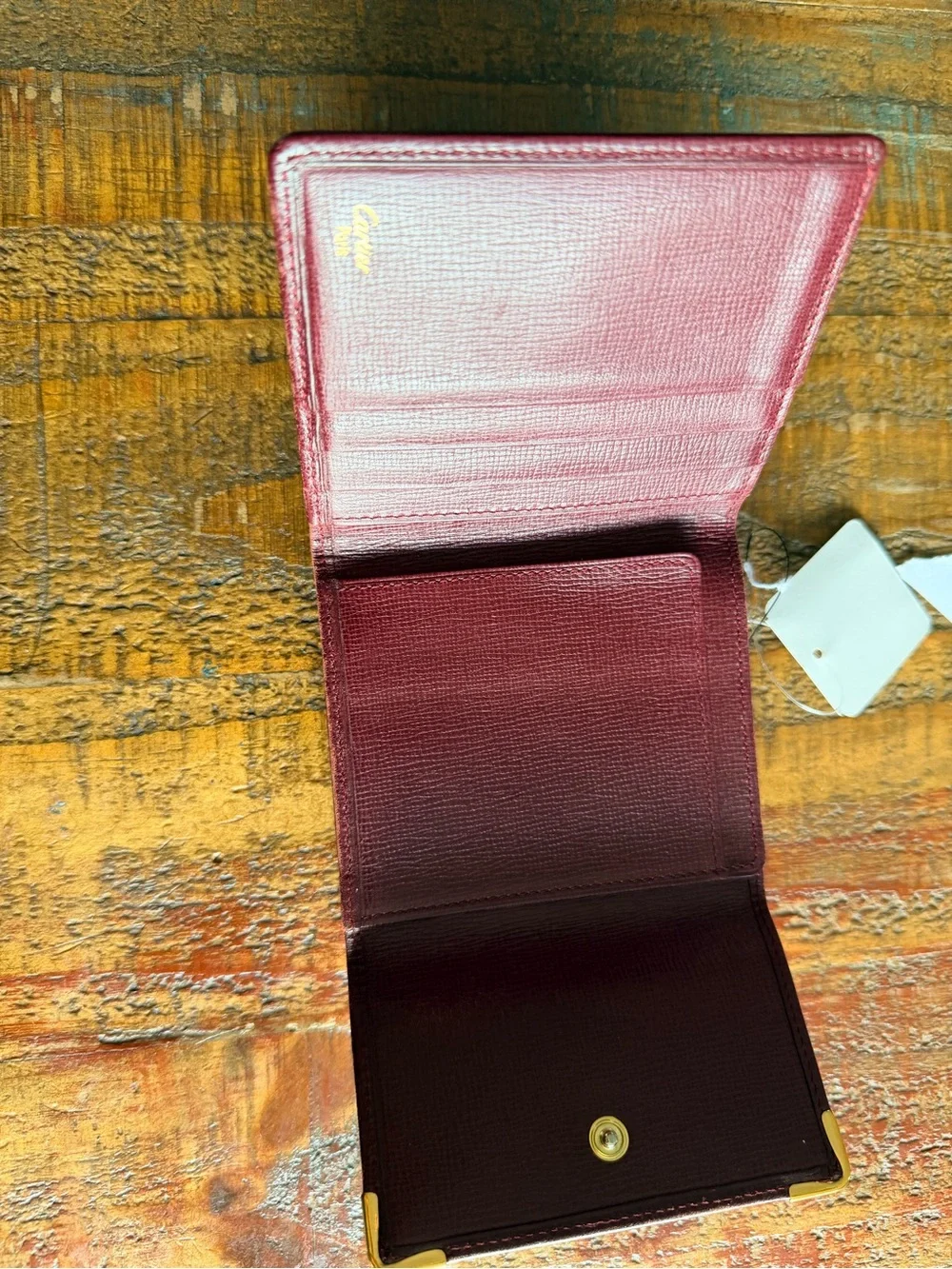 Cartier Plum Leather Compact Wallet with Gold Corner Details